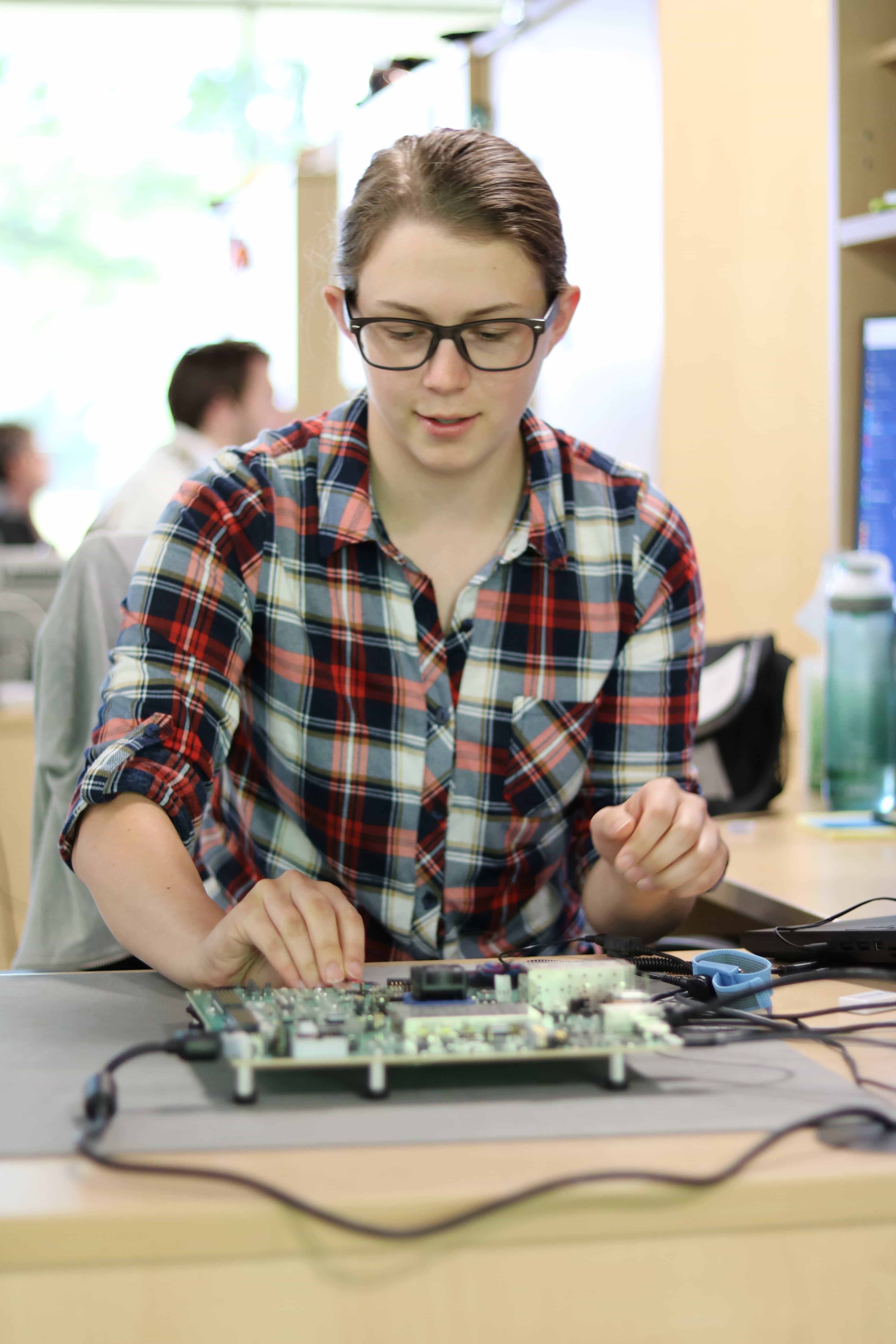 Engineer Anna Little works with a Xilinx Zynq UltraScale+ MPSoC, a capable platform for virtualized systems.